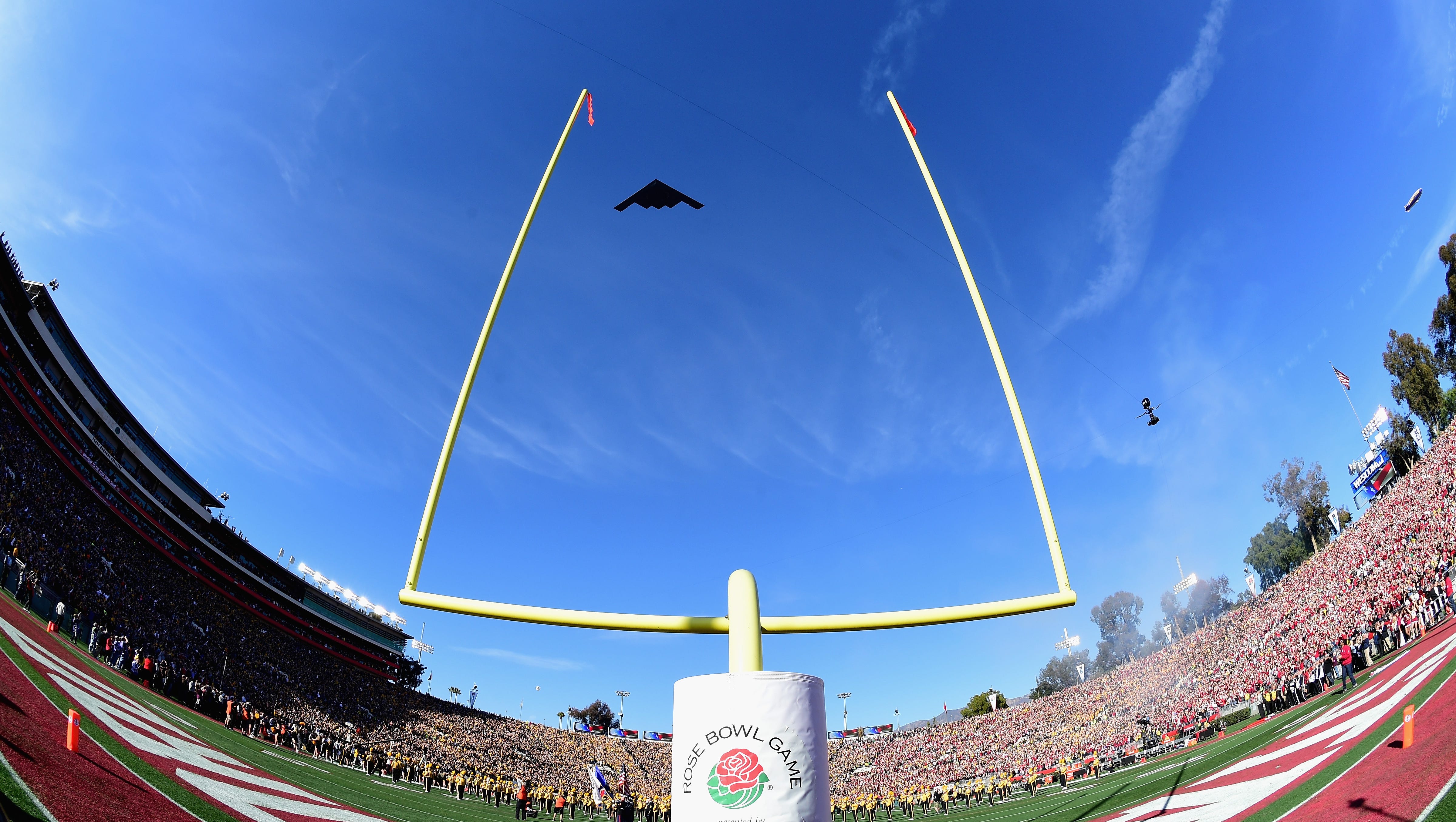 A stealth bomber flies over the stadium before the start of the 102nd Rose Bowl Game between the Iowa Hawkeyes and the Stanford Cardinal on January 1, 2016 at the Rose Bowl in Pasadena, California.