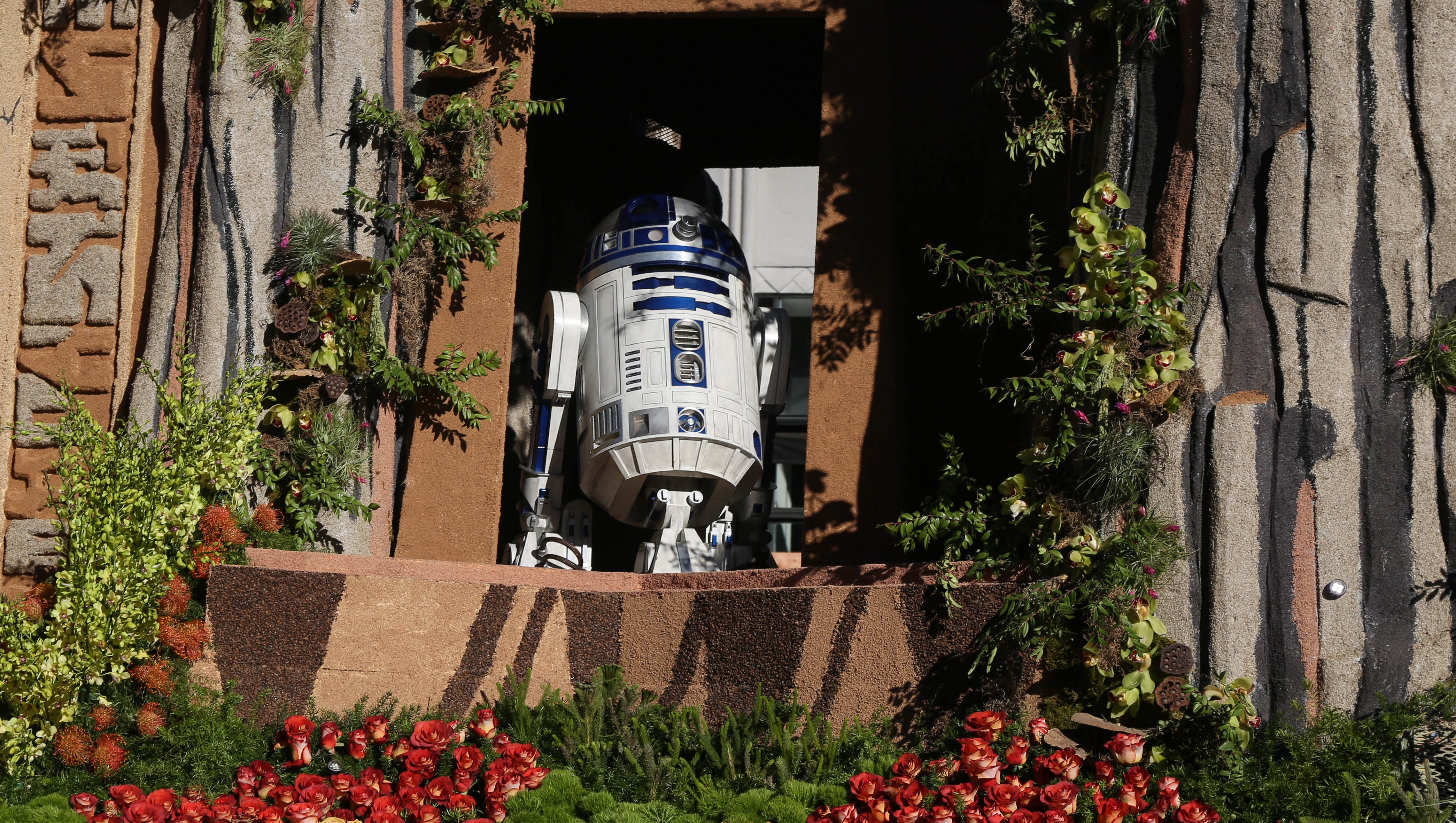 R2D2 rides the Disney float on Friday, Jan. 1, 2016, during the 2016 Tournament of Roses Parade in Pasadena, Calif.