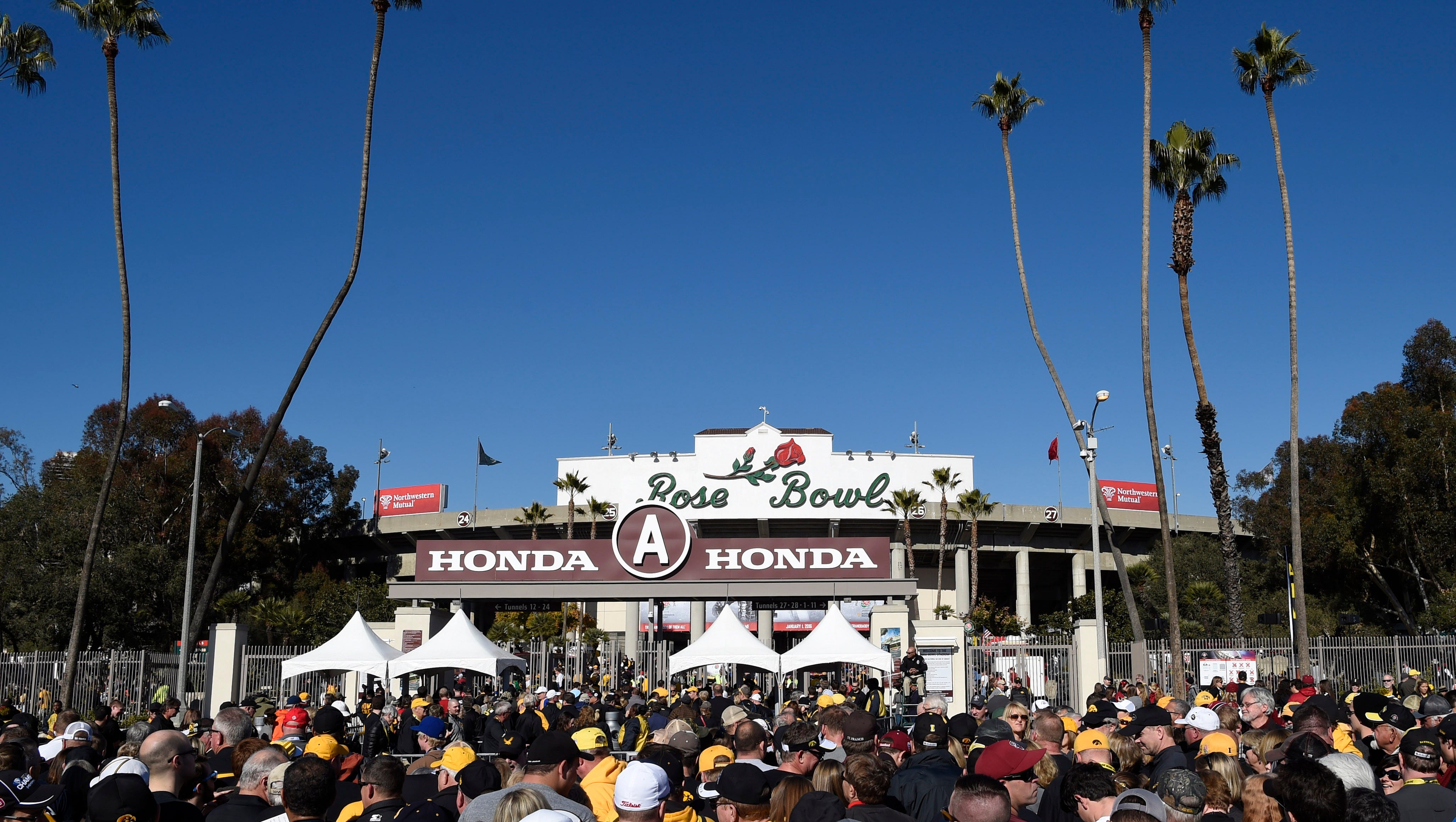 Fans wait to enter the Rose Bowl before the game between the Iowa Hawkeyes and the Stanford Cardinal in the 2016 Rose Bowl.