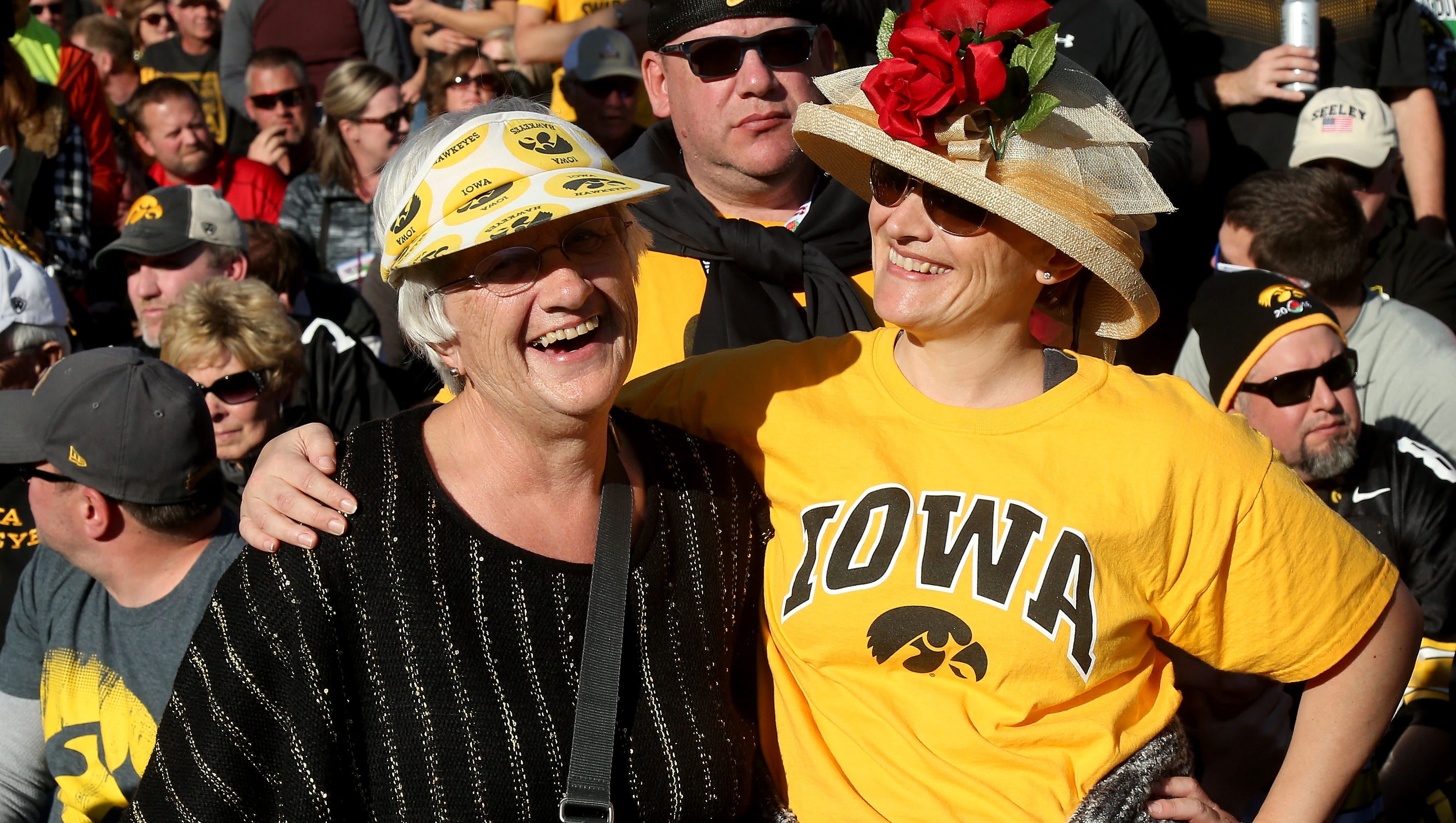 A pair of Iowa fans in the stands during the 102nd Rose Bowl Game between the Stanford Cardinal and the Iowa Hawkeyes on January 1, 2016 at the Rose Bowl in Pasadena, California.