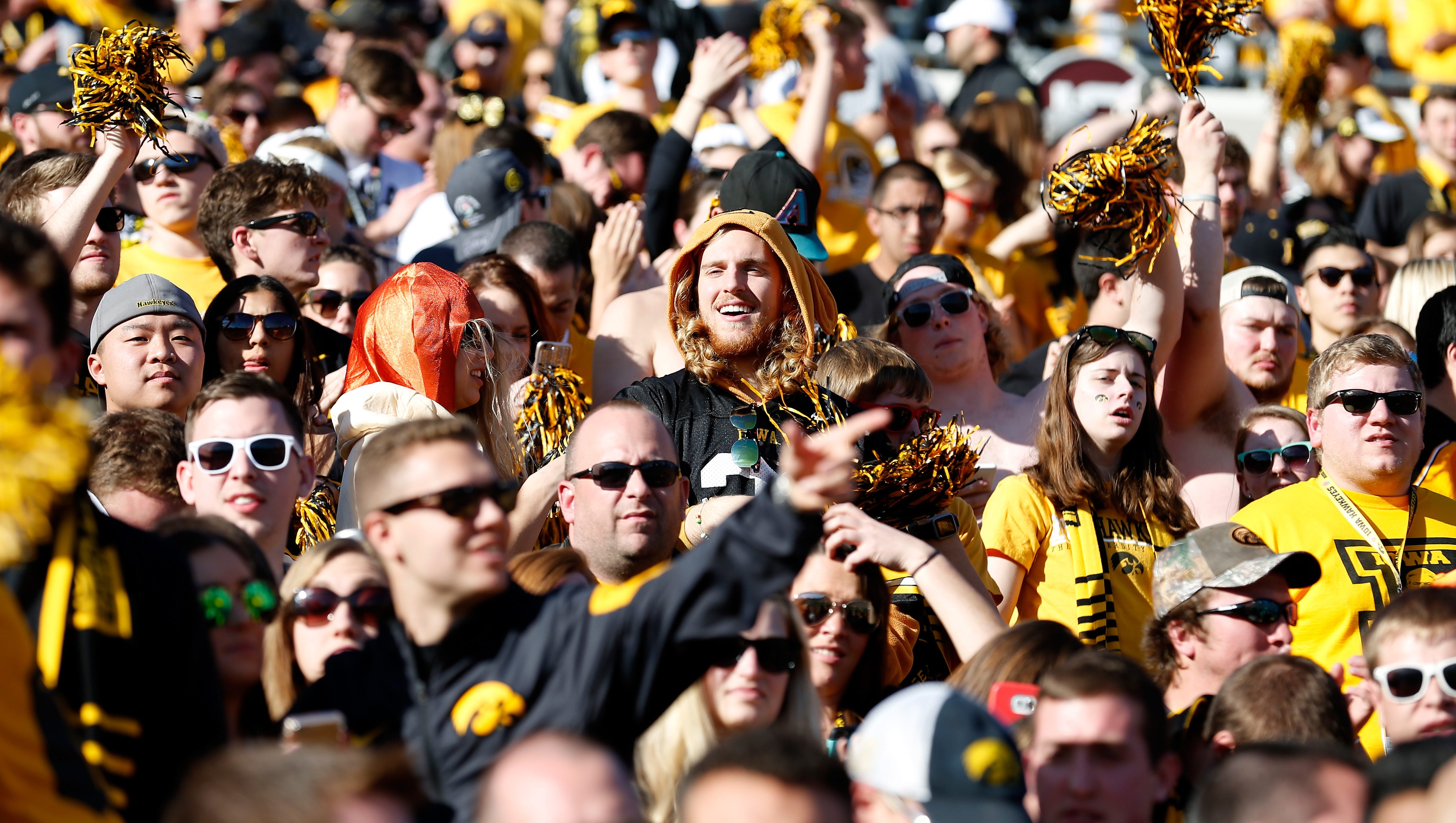 Iowa Hawkeyes fans cheer before the 102nd Rose Bowl Game against the Stanford Cardinal on January 1, 2016 at the Rose Bowl in Pasadena, California.