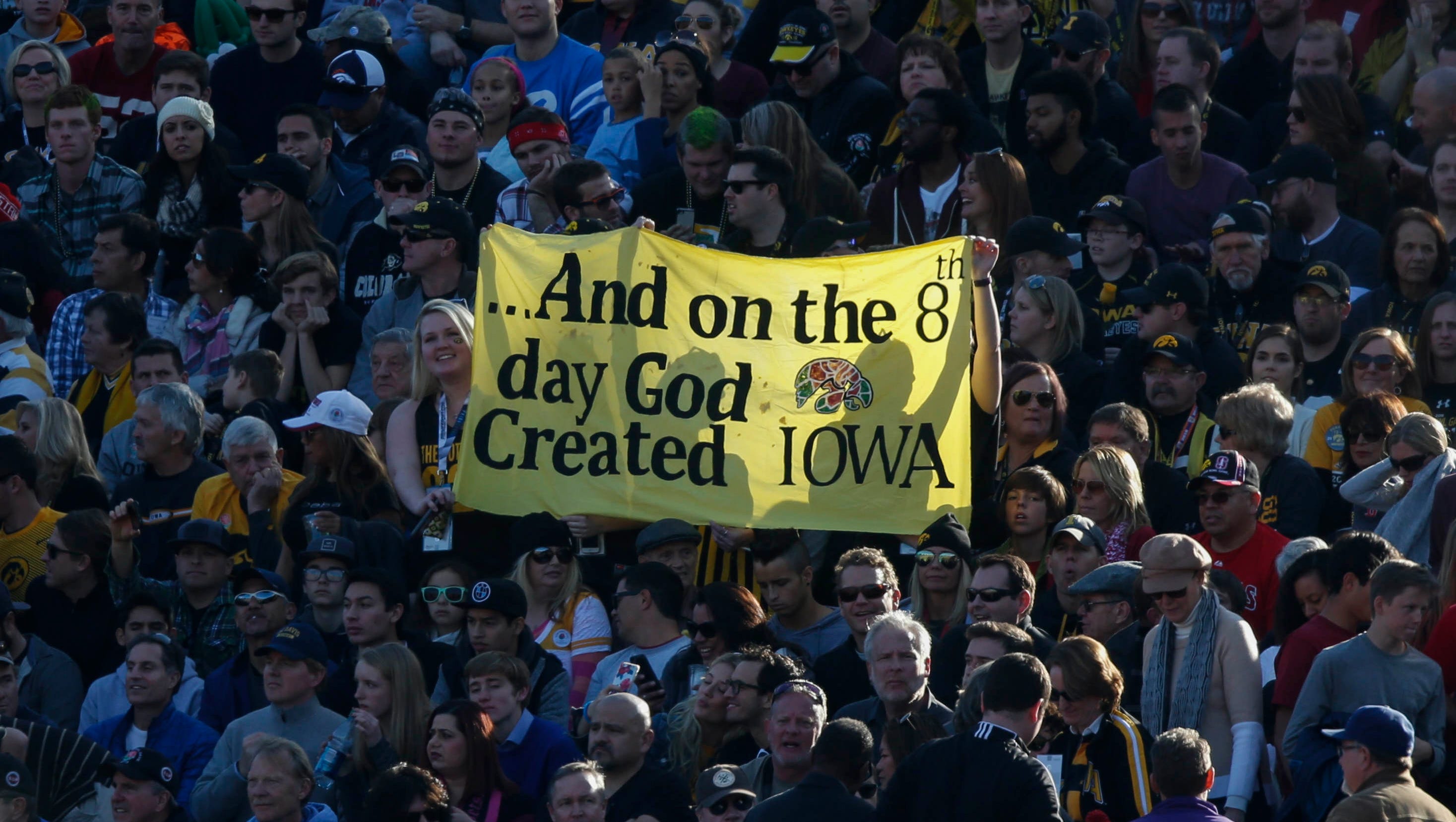 Iowa fans hold up a sign during the game against Stanford on Friday, Jan. 1, 2016, at the Rose Bowl in Pasadena, Calif.