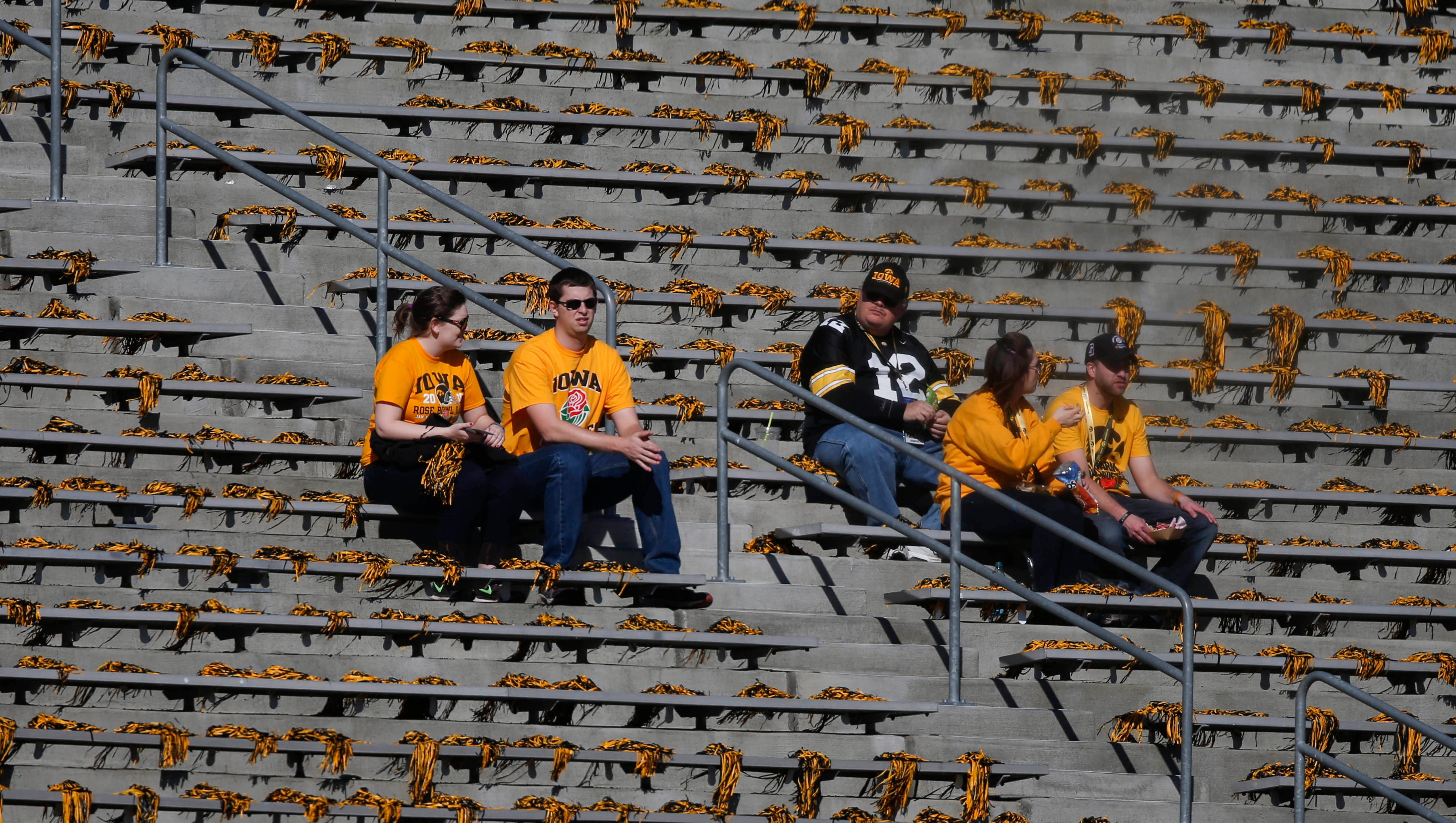 Iowa Hawkeye football fans are among the first to find their seats prior to kickoff against Stanford on Friday, Jan. 1, 2016, at the Rose Bowl in Pasadena, Calif.