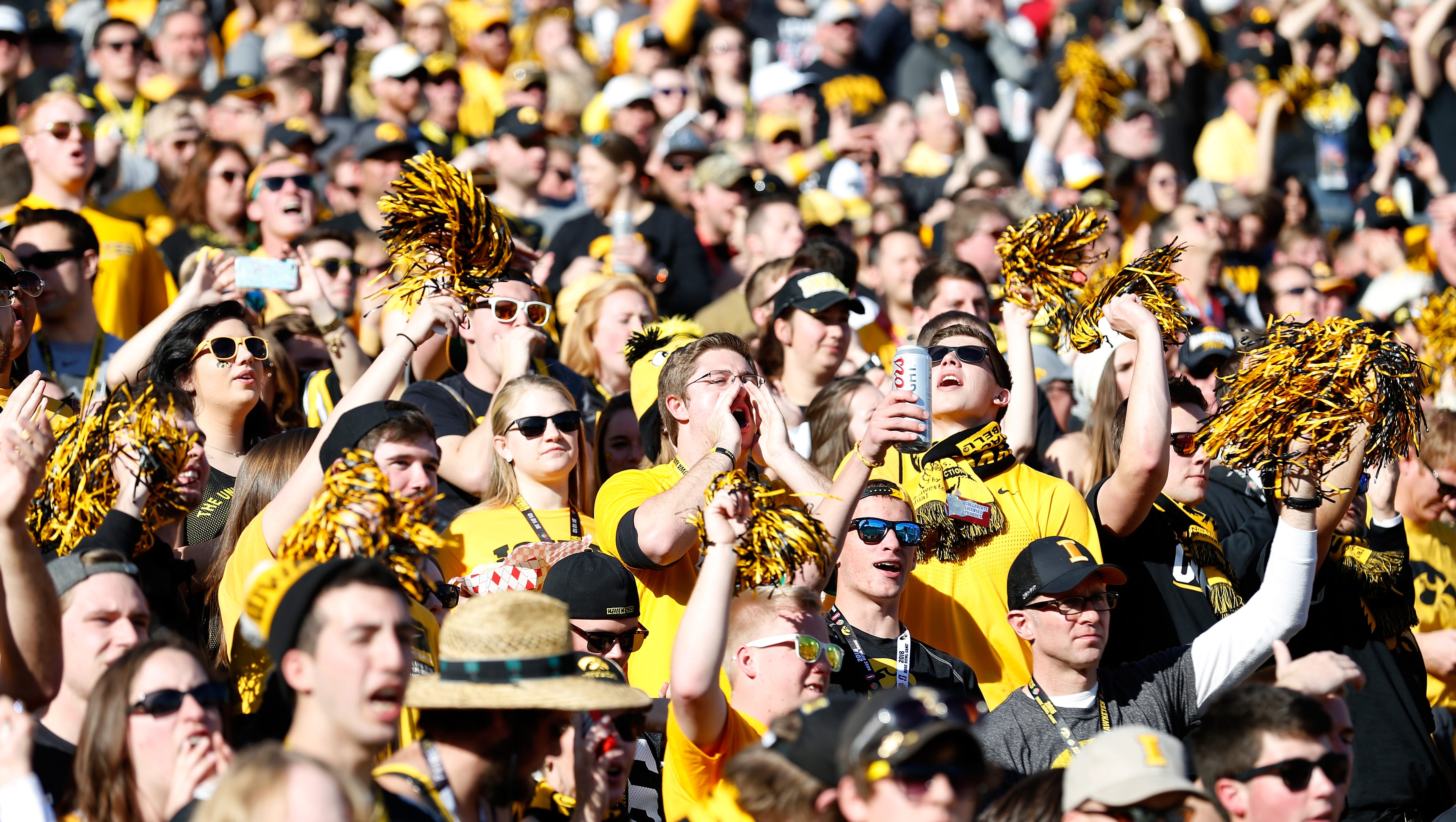 Iowa Hawkeyes fans cheer before the 102nd Rose Bowl Game against the Stanford Cardinal on January 1, 2016 at the Rose Bowl in Pasadena, California.