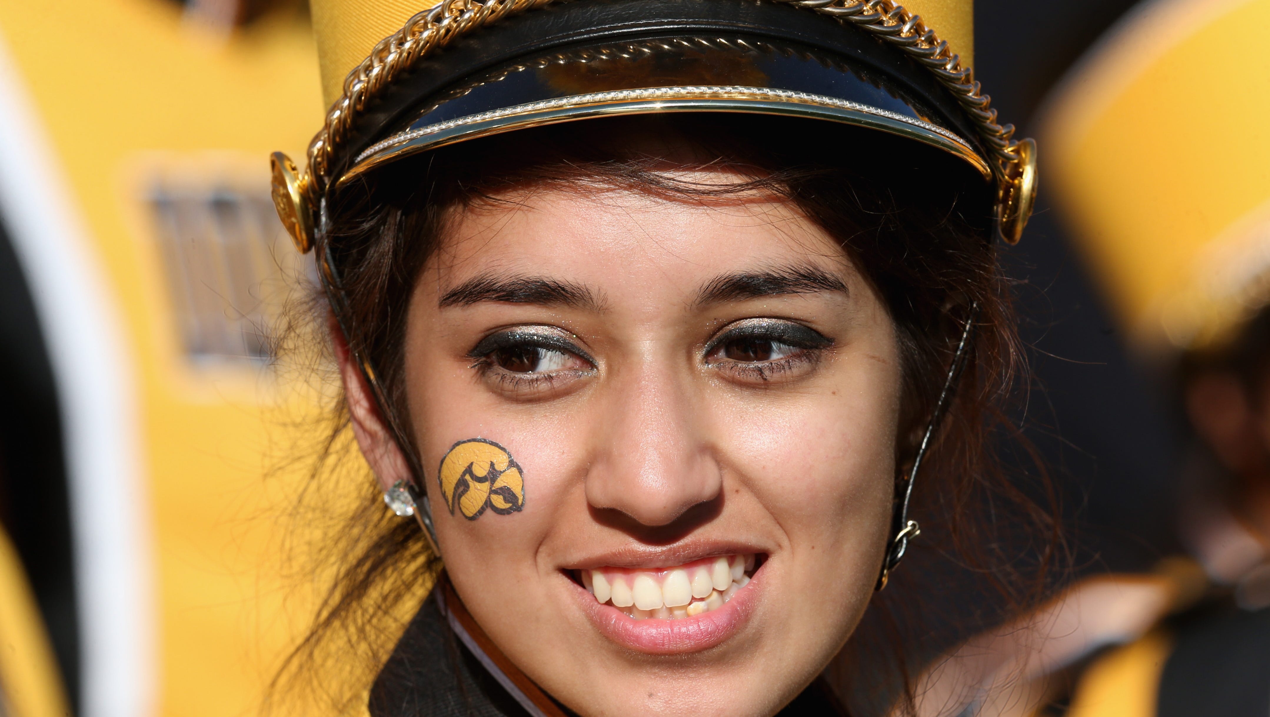 A band member from Iowa smiles before the 102nd Rose Bowl Game between the Iowa Hawkeyes and the Stanford Cardinal on January 1, 2016 at the Rose Bowl in Pasadena, California.