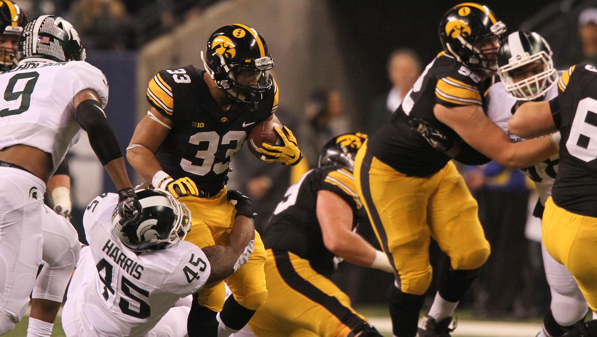 Iowa running back Jordan Canzeri runs down field during the Hawkeyes' Big Ten Championship game against Michigan State at Lucas Oil Stadium in Indianapolis, Ind. on Saturday, Dec. 5, 2015.