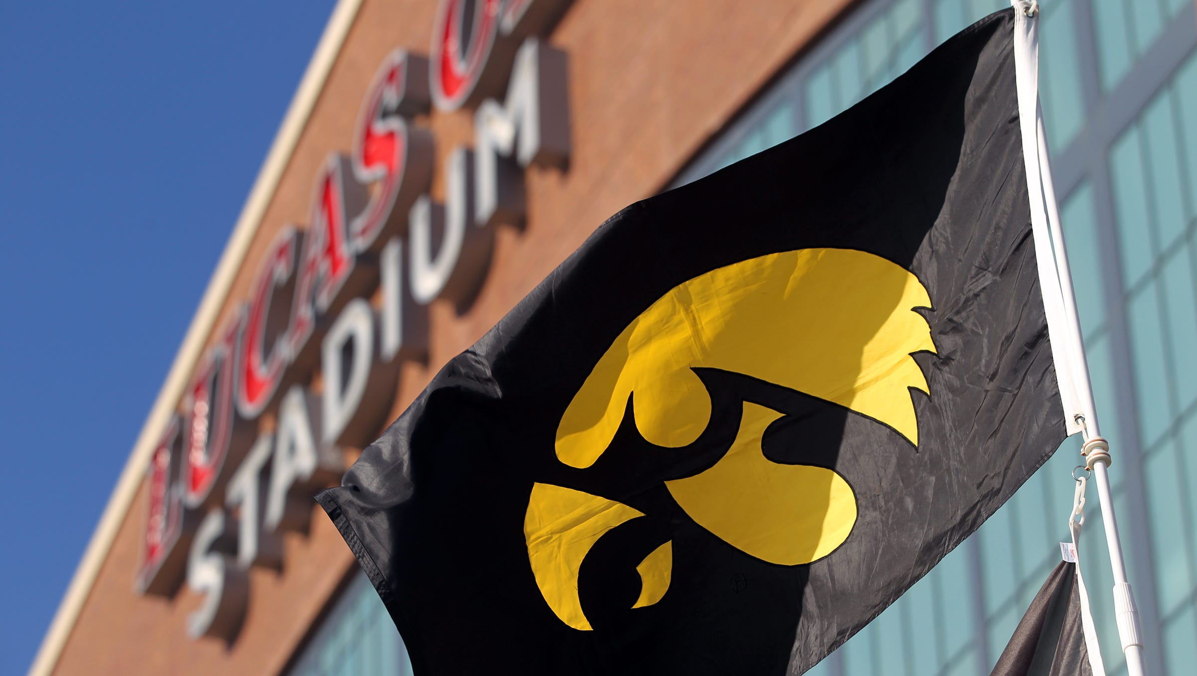 An Iowa flag waves at a tailgate prior to the Hawkeyes' Big Ten Championship game against Michigan State at Lucas Oil Stadium in Indianapolis, Ind. on Saturday, Dec. 5, 2015.