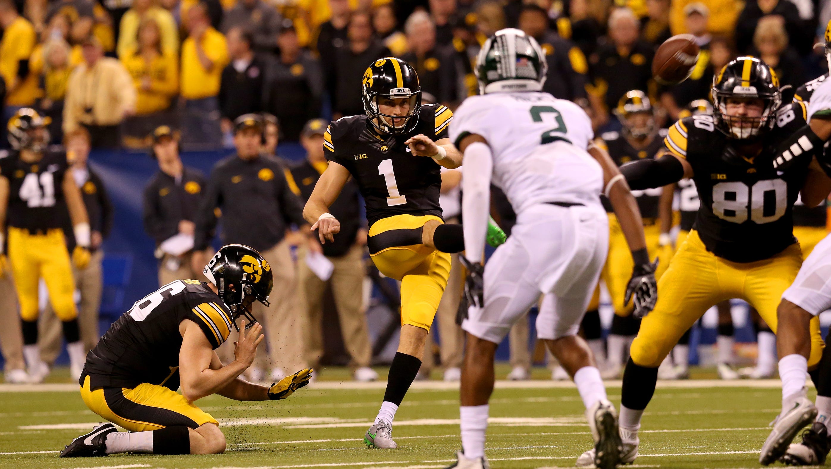 Iowa kicker Marshall Koehn (1) makes his first field goal in the first half against Michigan State during the Big Ten Championship Game at Lucas Oil Stadium on Dec. 5, 2015.