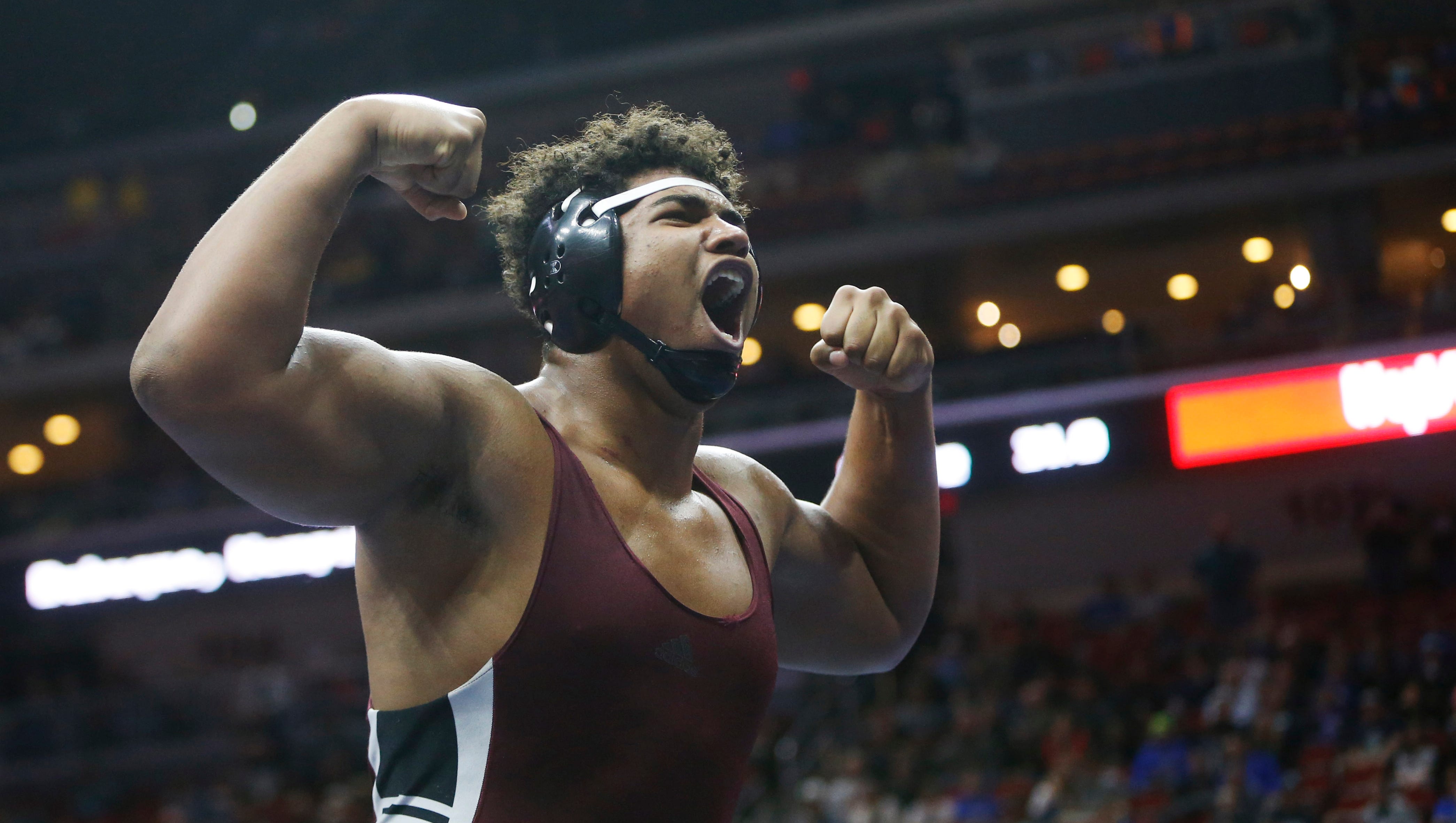 Mount Vernon's Tristan Wirfs celebrates his win in the class 2A, 220-pound title match Saturday, Feb. 18, 2017, in the state wrestling finals at Wells Fargo Arena in Des Moines.