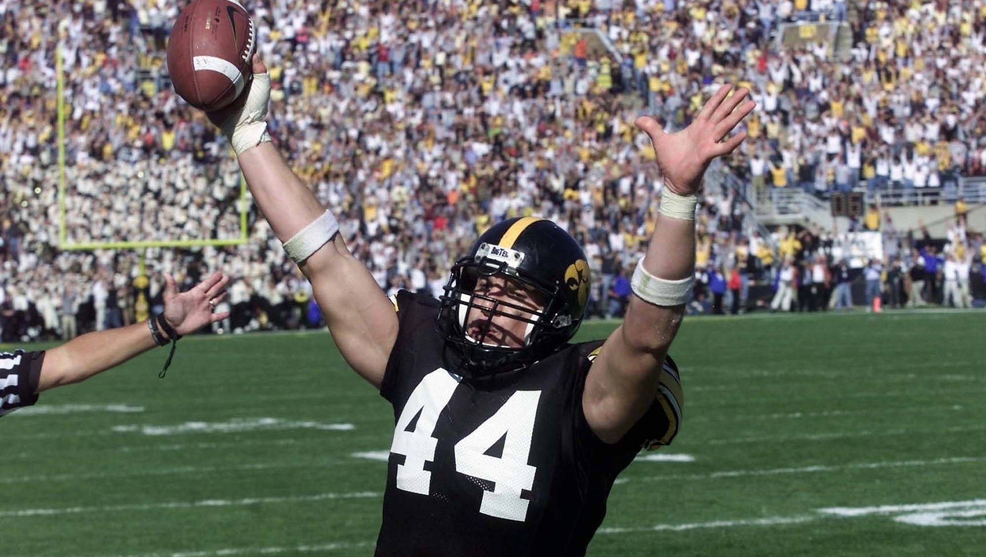 Dallas Clark catches the go-ahead touchodwn pass against Purdue in 2002 with 67 seconds left, a fourth-down catch that propelled Iowa to a 31-28 win. Earlier in that game, Clark raced for a 95-yard touchdown catch up the left sideline.