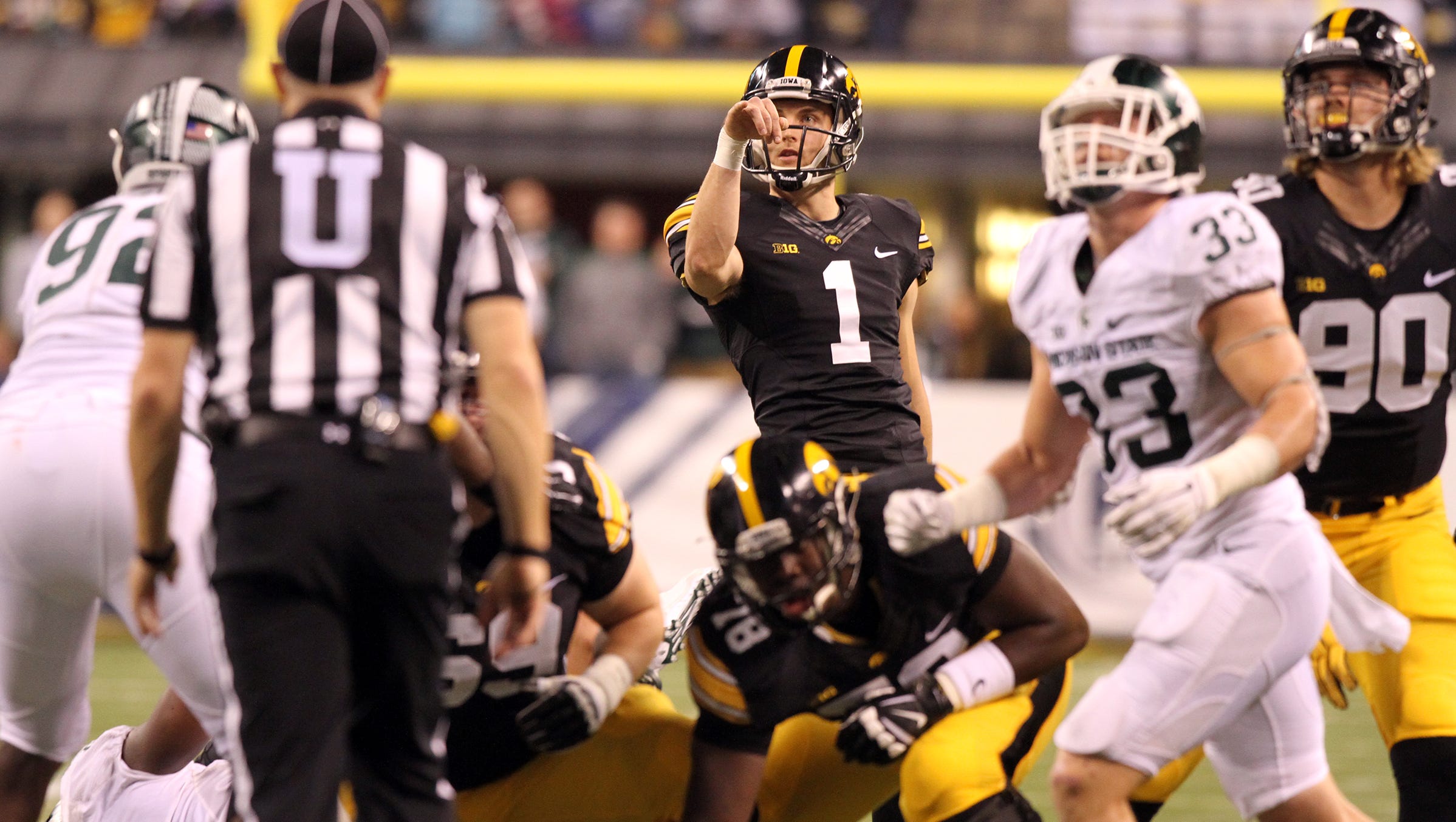 Iowa's Marshall Koehn kicks a field goal during the Hawkeyes' Big Ten Championship game against Michigan State at Lucas Oil Stadium in Indianapolis, Ind. on Saturday, Dec. 5, 2015.