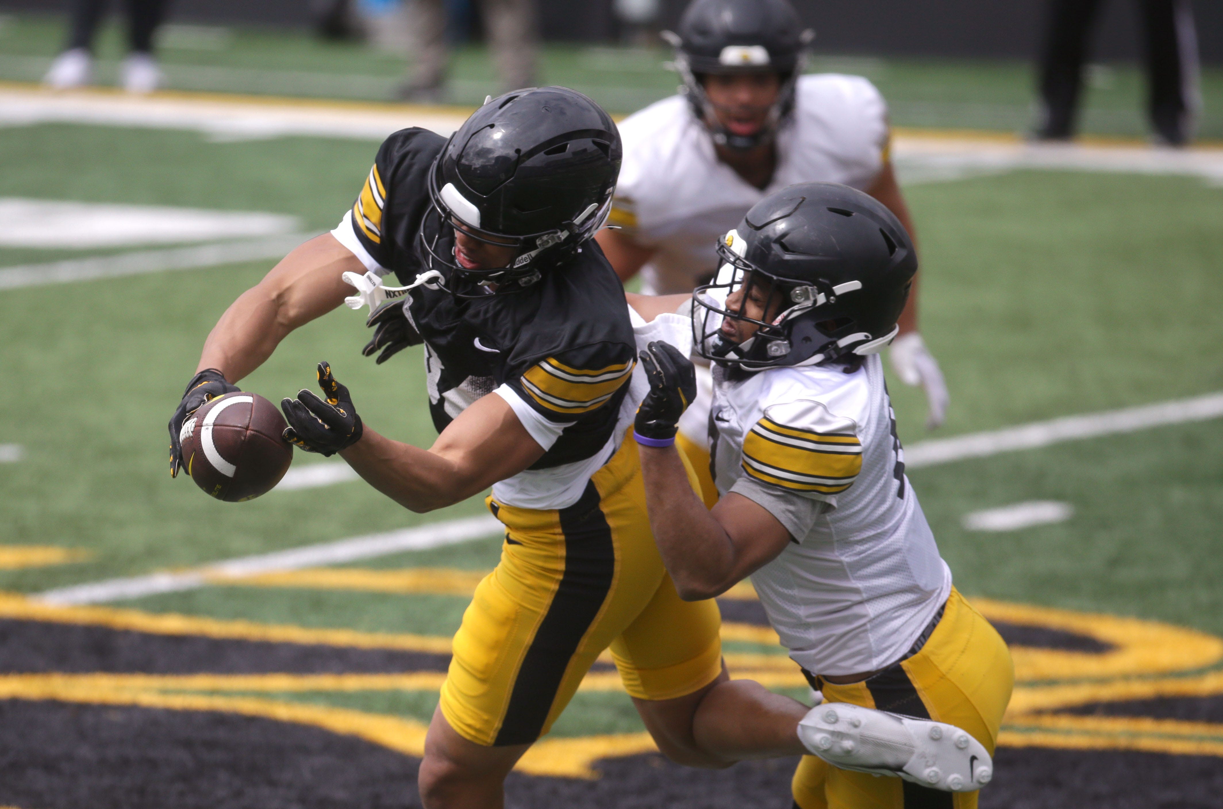 Iowa Hawkeyes wide receiver Jarriett Buie (84) attempts to catch a pass during an open spring practice Saturday, April 20, 2024 at Kinnick Stadium in Iowa City, Iowa.