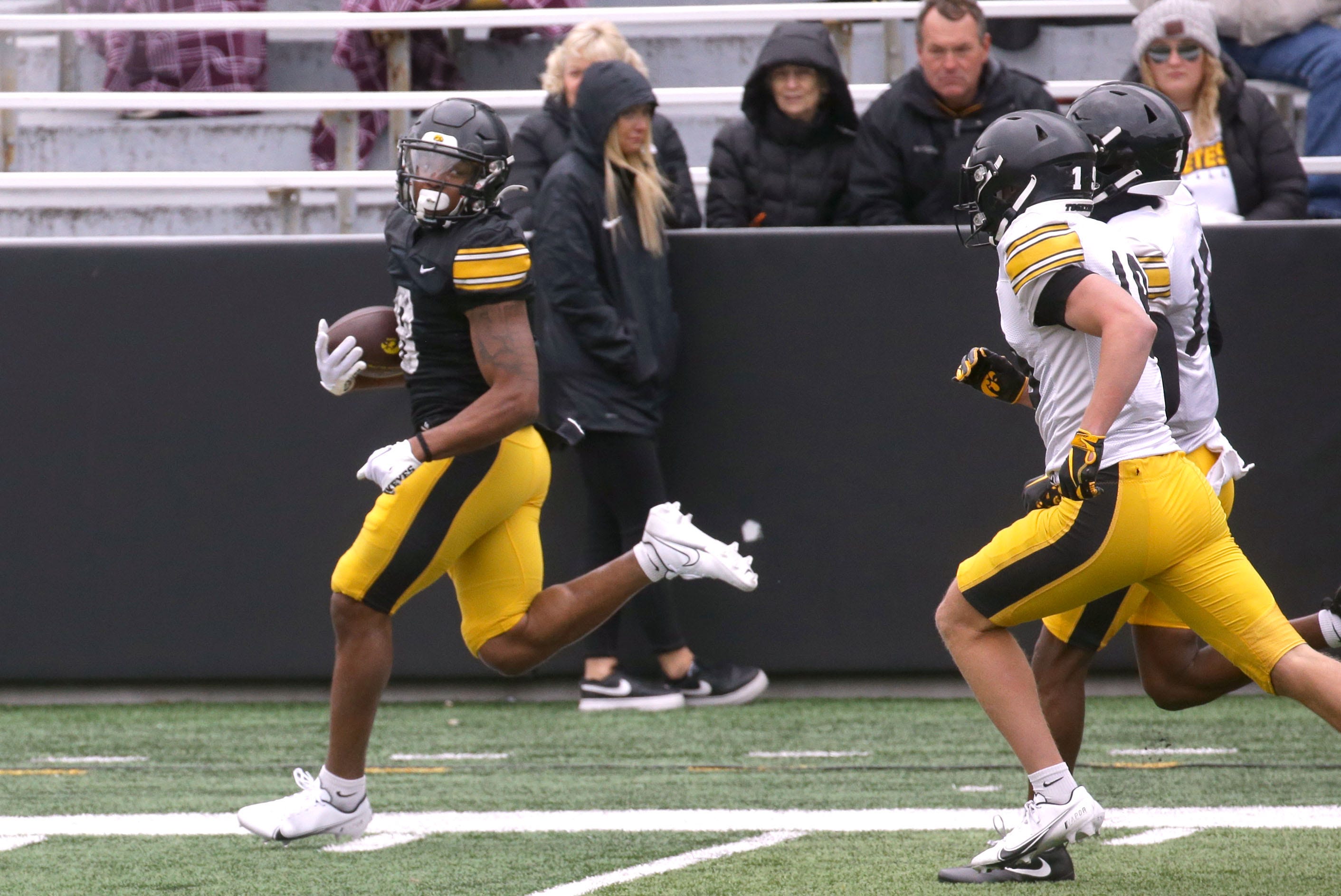 Iowa Hawkeyes running back Terrell Washington Jr. looks back at the defense while running to the endzone during an open spring practice Saturday, April 20, 2024 at Kinnick Stadium in Iowa City, Iowa.