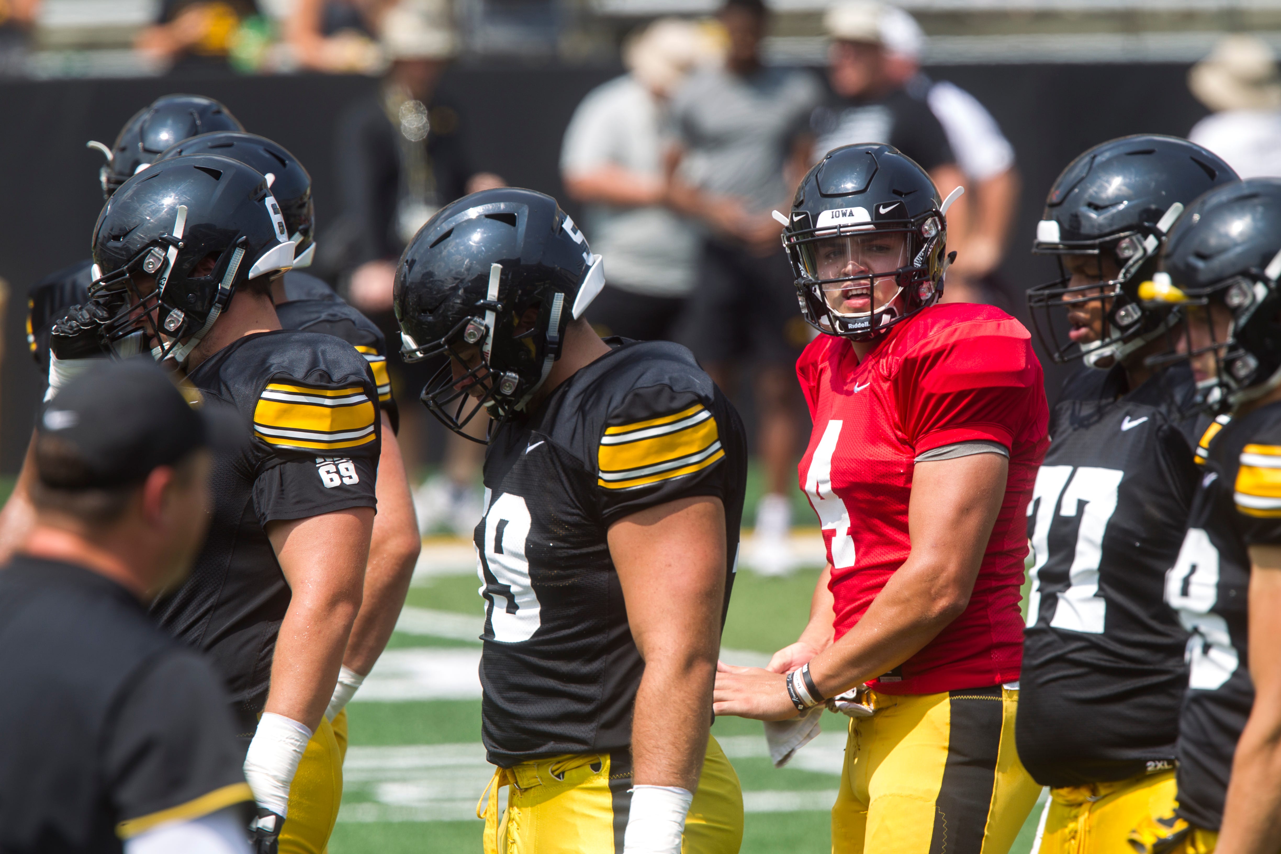 Iowa quarterback Nate Stanley looks to the sideline during a Kids Day practice on Saturday, Aug. 11, 2018, at Kinnick Stadium in Iowa City.