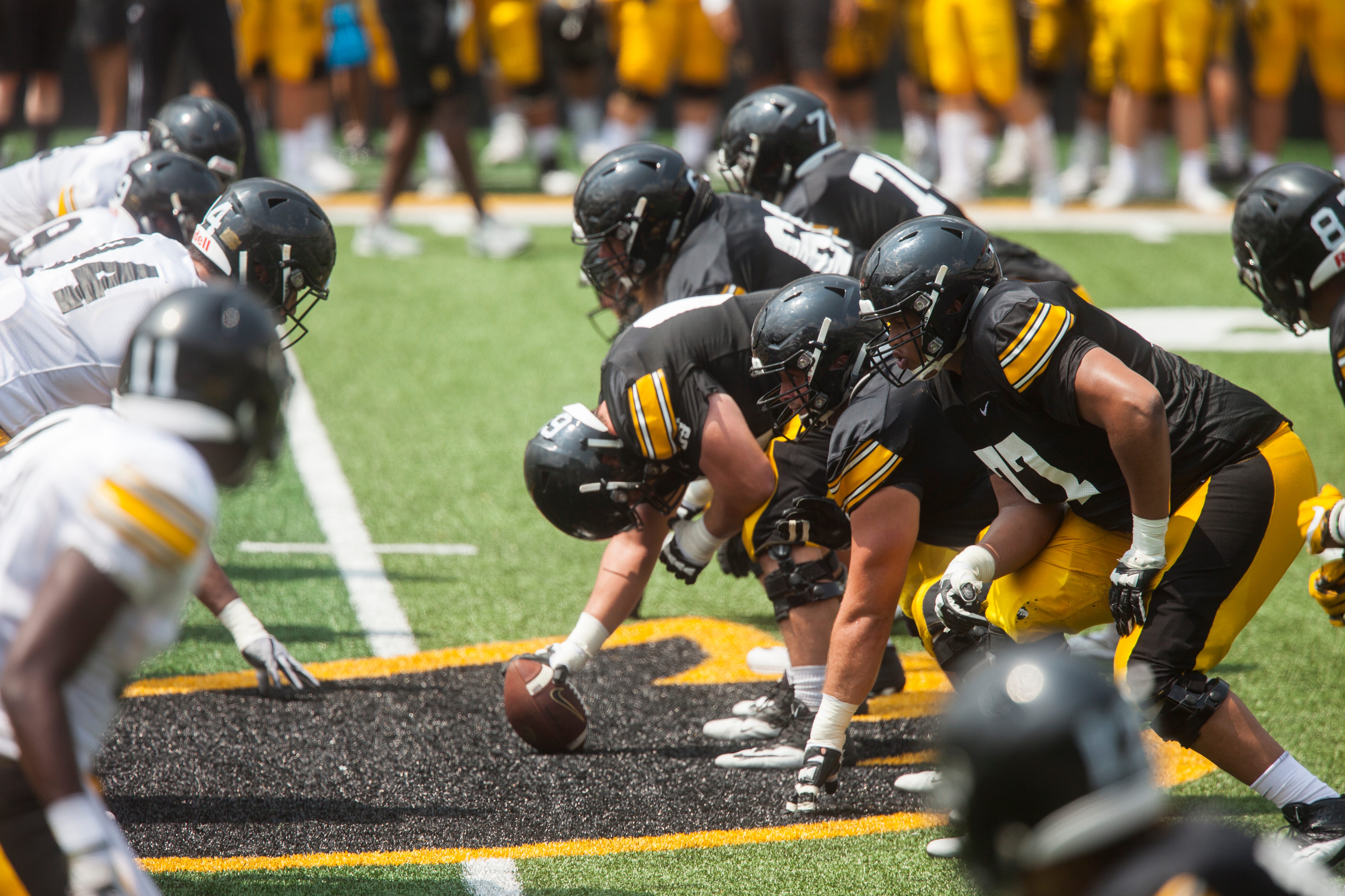 Iowa offensive lineman Alaric Jackson (77) lines up during a Kids Day practice on Saturday, Aug. 11, 2018, at Kinnick Stadium in Iowa City.