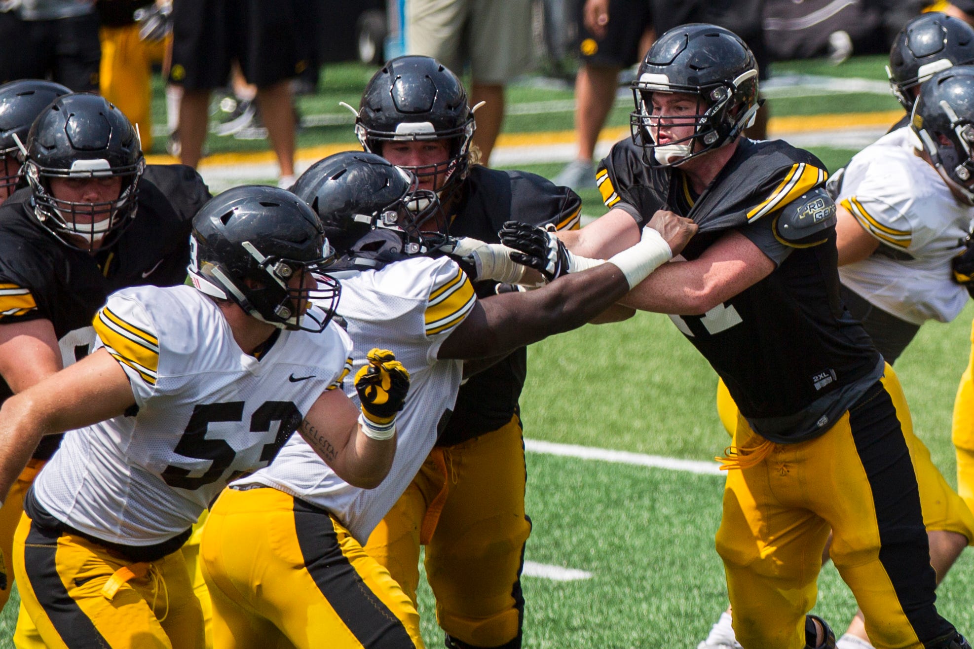 Iowa offensive lineman Mark Kallenberger (71) runs through a drill during a Kids Day practice on Saturday, Aug. 11, 2018, at Kinnick Stadium in Iowa City.