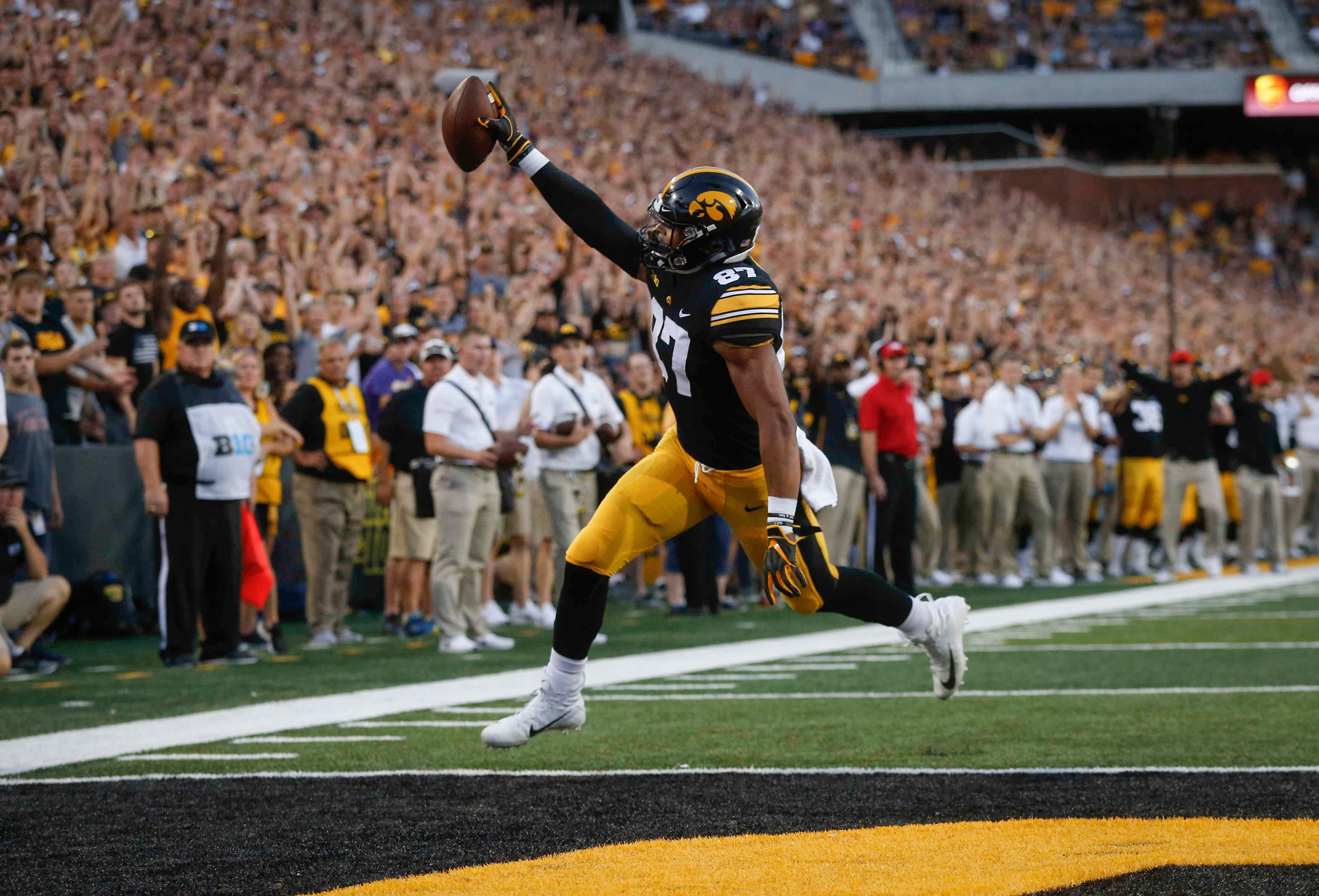 Iowa junior tight end Noah Fant celebrates in the end zone after scoring a touchdown against Northern Iowa in the first quarter on Saturday, Sept. 15, 2018, at Kinnick Stadium in Iowa City.