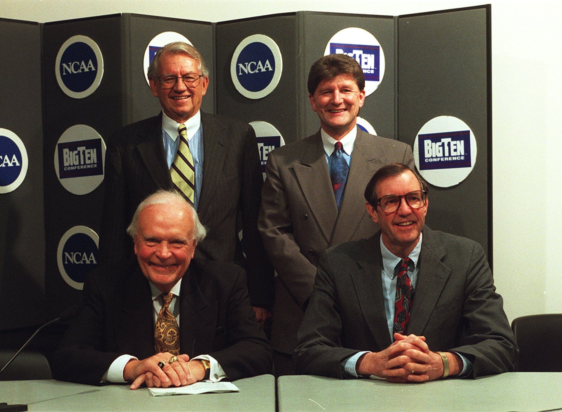 From 1996: Longtime Hawkeye broadcasters, clockwise from top left, Jim Zabel, Gary Dolphin, Ron Gonder and Bob Brooks. Register file photo