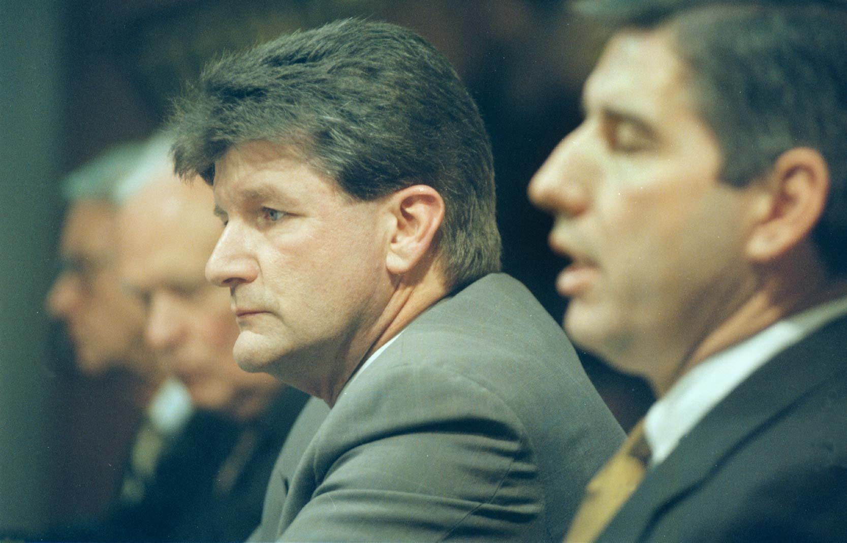 From 1996: Gary Dolphin listens as University of Iowa Athletic Director Bob Bowlsby, right, responds to a question during a news conference after Dolphin was named the new radio play-by-play announcer for the university and Learfield Communications, Inc. In background are Jim Zabel (left) and Bob Brooks.