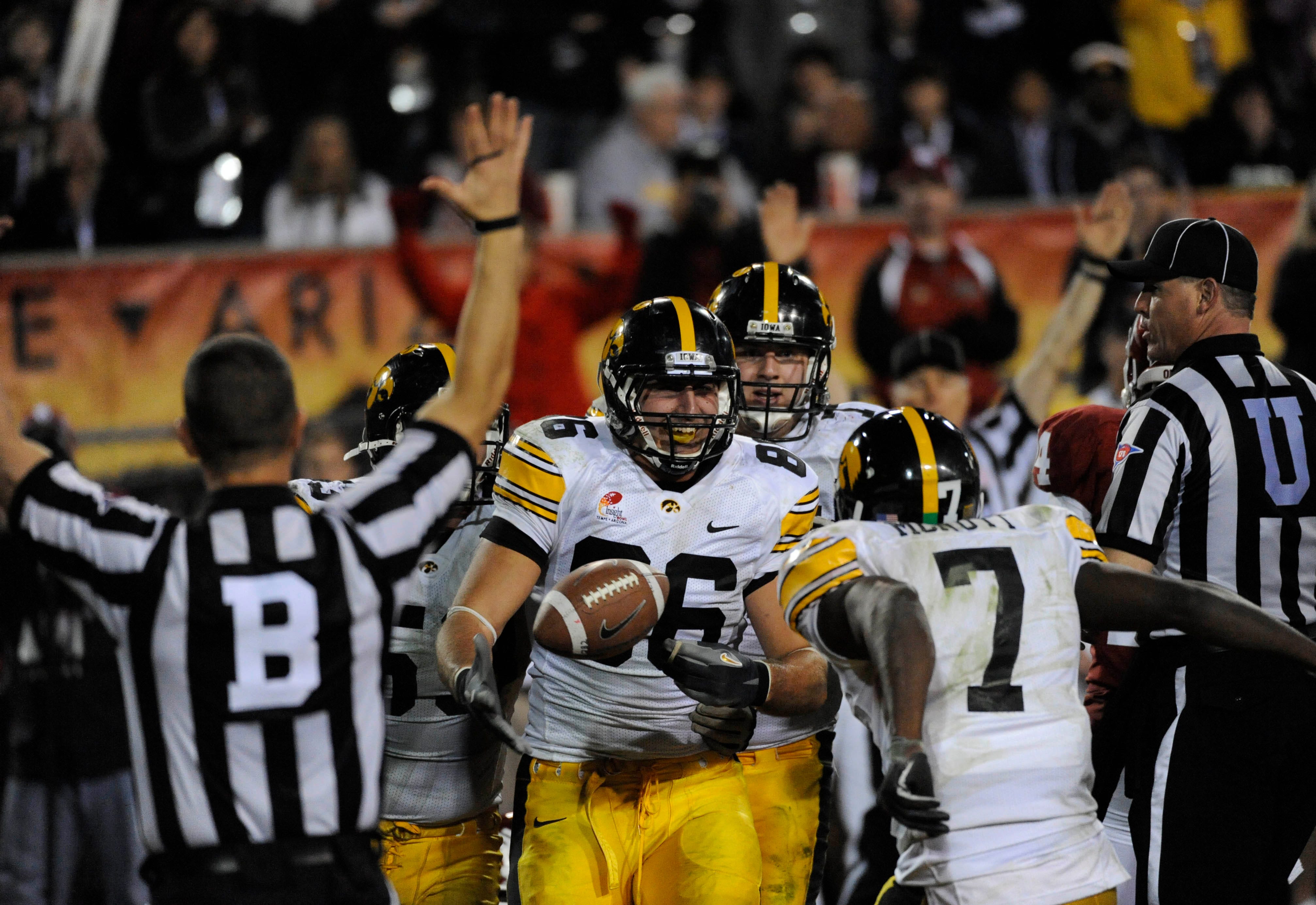 Dec 30, 2011; Tempe, AZ, USA; Iowa Hawkeyes tight end C.J. Fiedorowicz (86) and wide receiver Marvin McNutt (7) celebrate a touchdown against Oklahoma Sooners during the second half of the 2011 Insight Bowl at the Sun Devil Stadium. Mandatory Credit: Richard Mackson-USA TODAY Sports