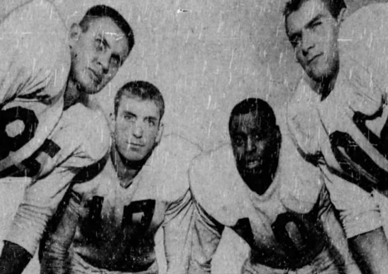 From 1956: Jim Gibbons, second from left, is tied for third all-time in touchdown catches by Iowa Hawkeyes tight ends with 11. From left, Hawkeyes center Don Suchy, Gibbons, end Frank Gilliam and guard Frank Bloomquist.