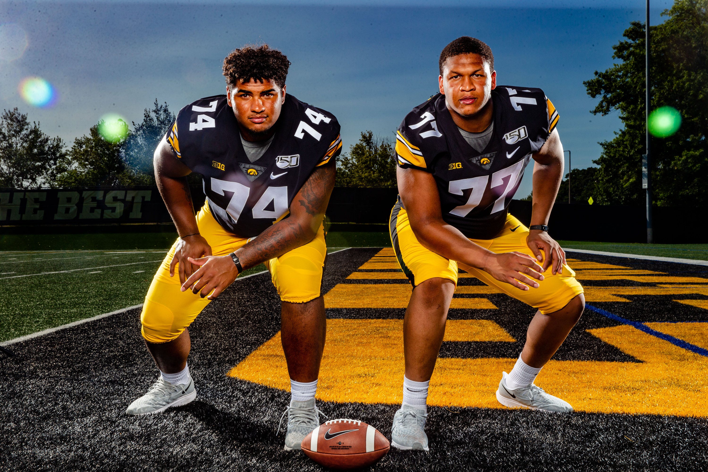 Tristan Wirfs and Alaric Jackson stand for a photo during Hawkeye football media day Friday, Aug. 9, 2019.