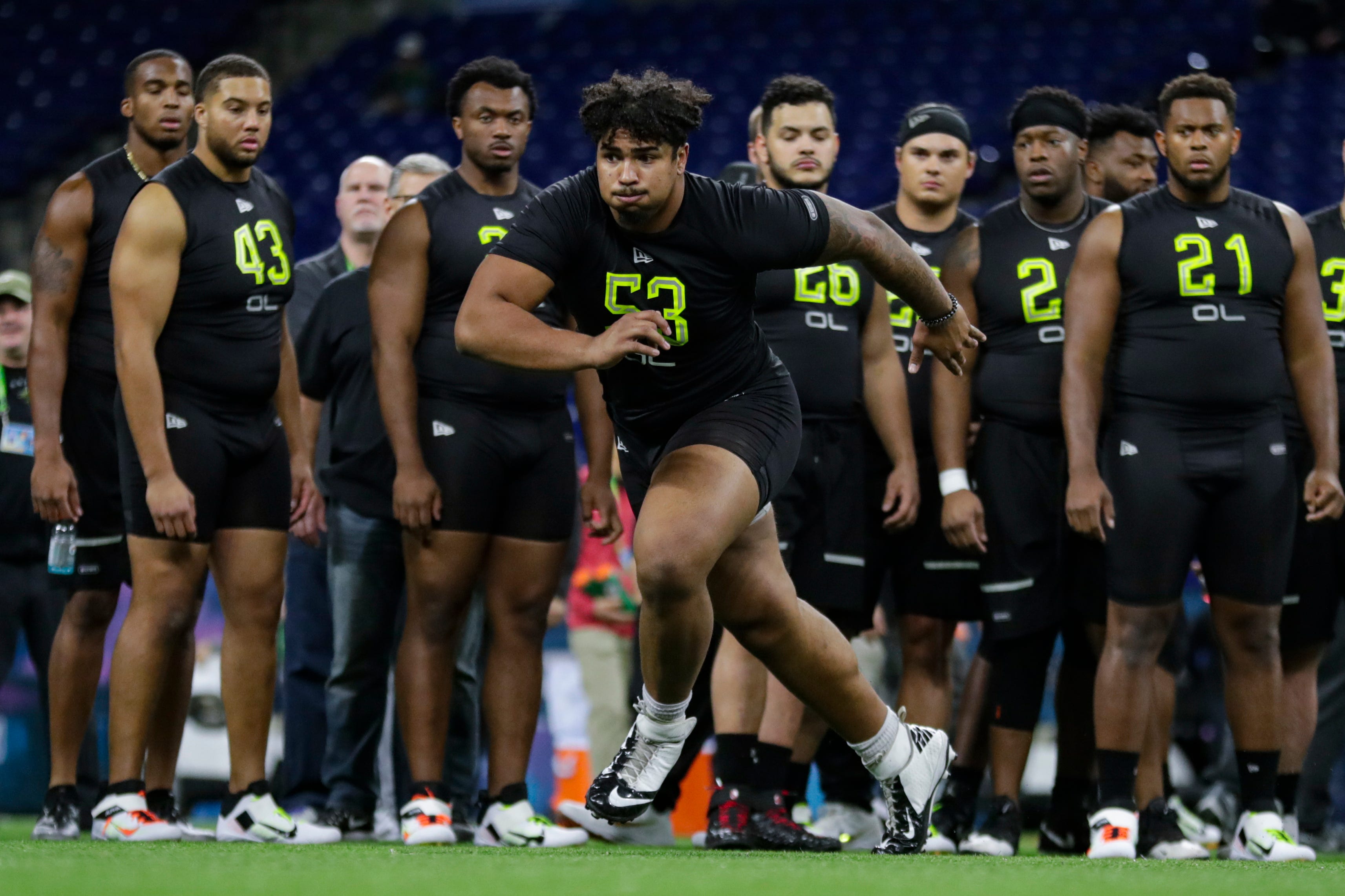 Iowa offensive lineman Tristan Wirfs runs a drill at the NFL football scouting combine in Indianapolis, Friday, Feb. 28, 2020.