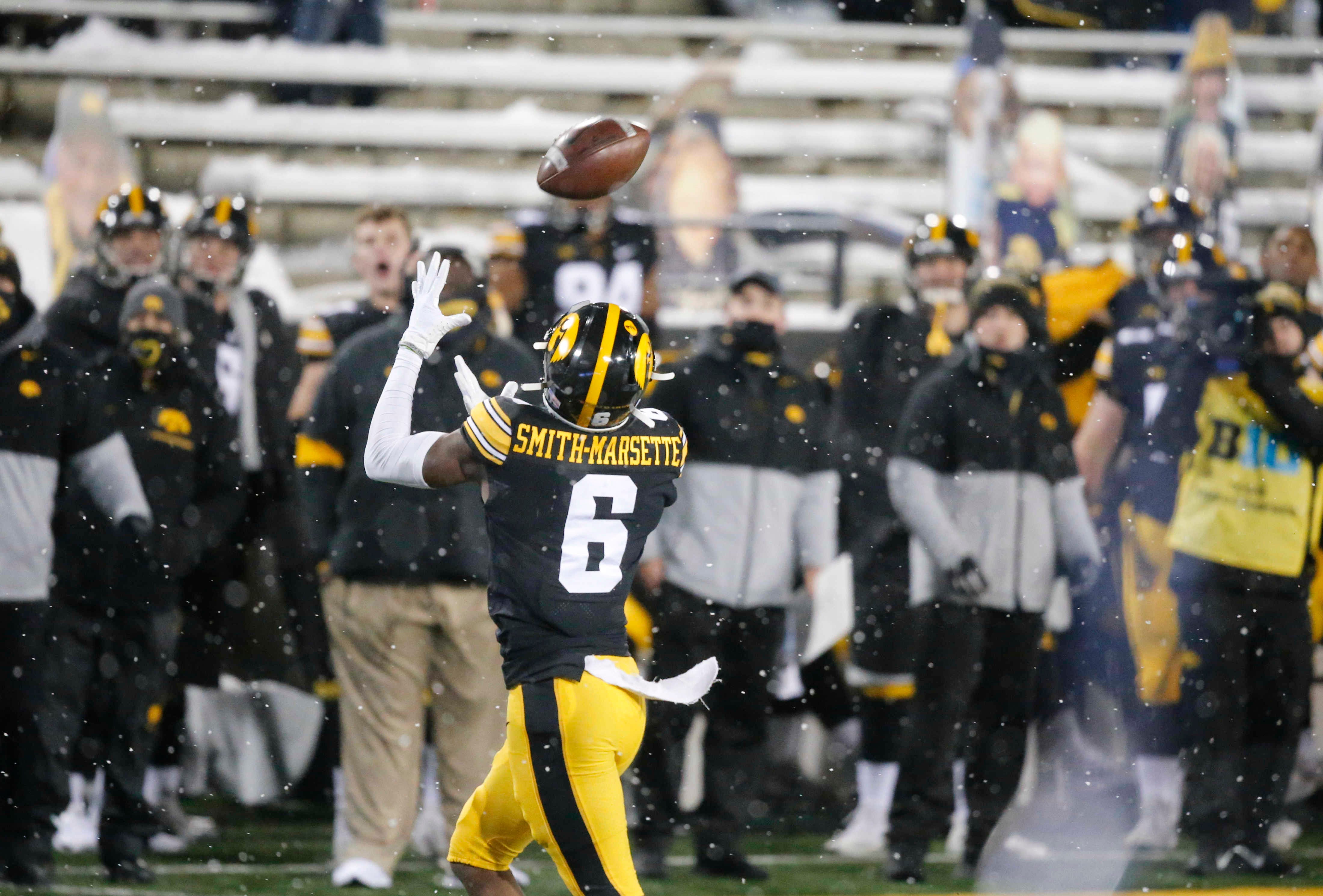 Iowa senior receiver Ihmir Smith-Marsette pulls down a touchdown reception in the third quarter against Wisconsin on Saturday, Dec. 12, 2020, at Kinnick Stadium in Iowa City, Iowa.