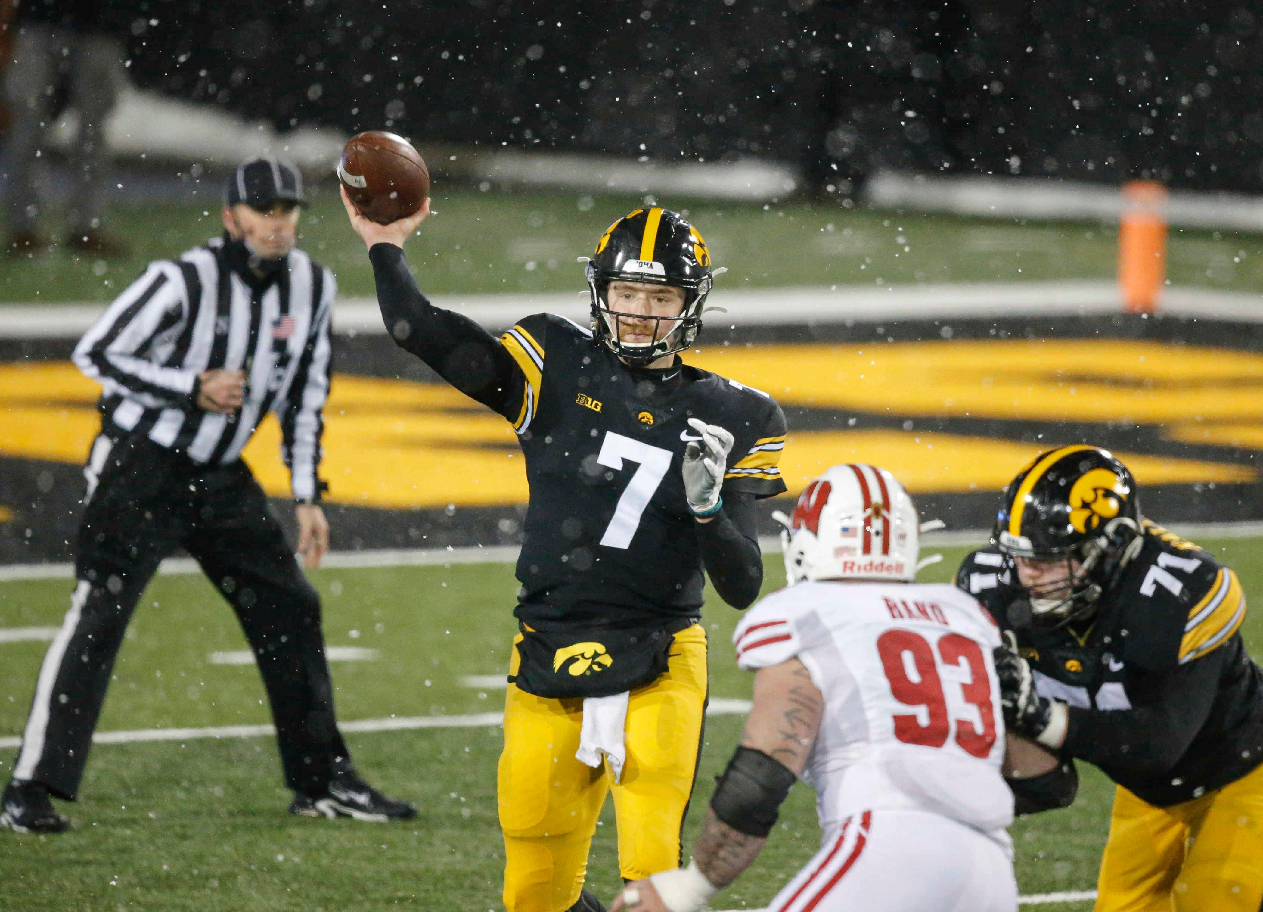Iowa sophomore quarterback Spencer Petras fires a pass in the fourth quarter against Wisconsin on Saturday, Dec. 12, 2020, at Kinnick Stadium in Iowa City, Iowa.