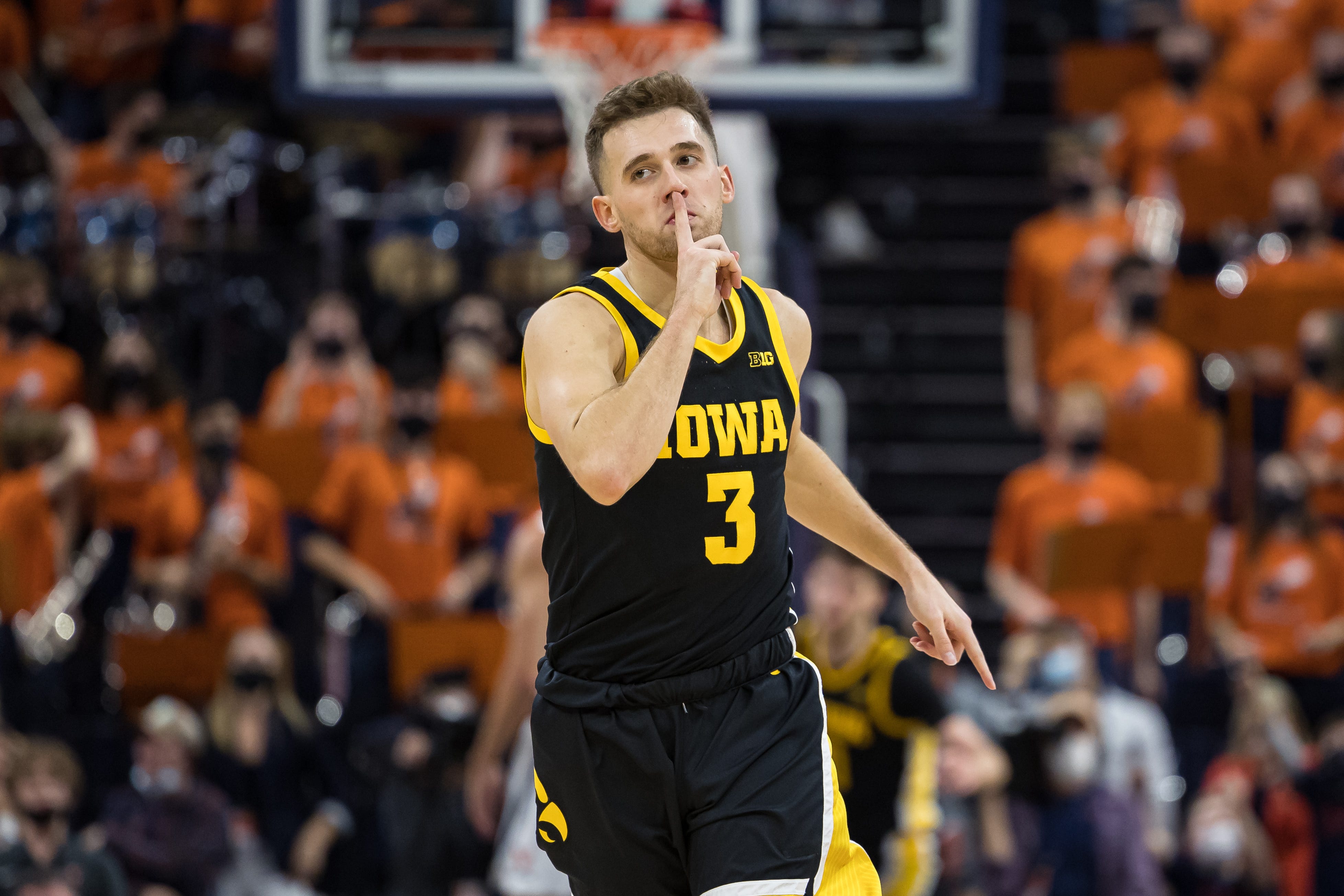Iowa Hawkeyes guard Jordan Bohannon (3) reacts after a play against the Virginia Cavaliers during the second half, Monday, Nov. 29, 2021, at John Paul Jones Arena in Charlottesville, Va.