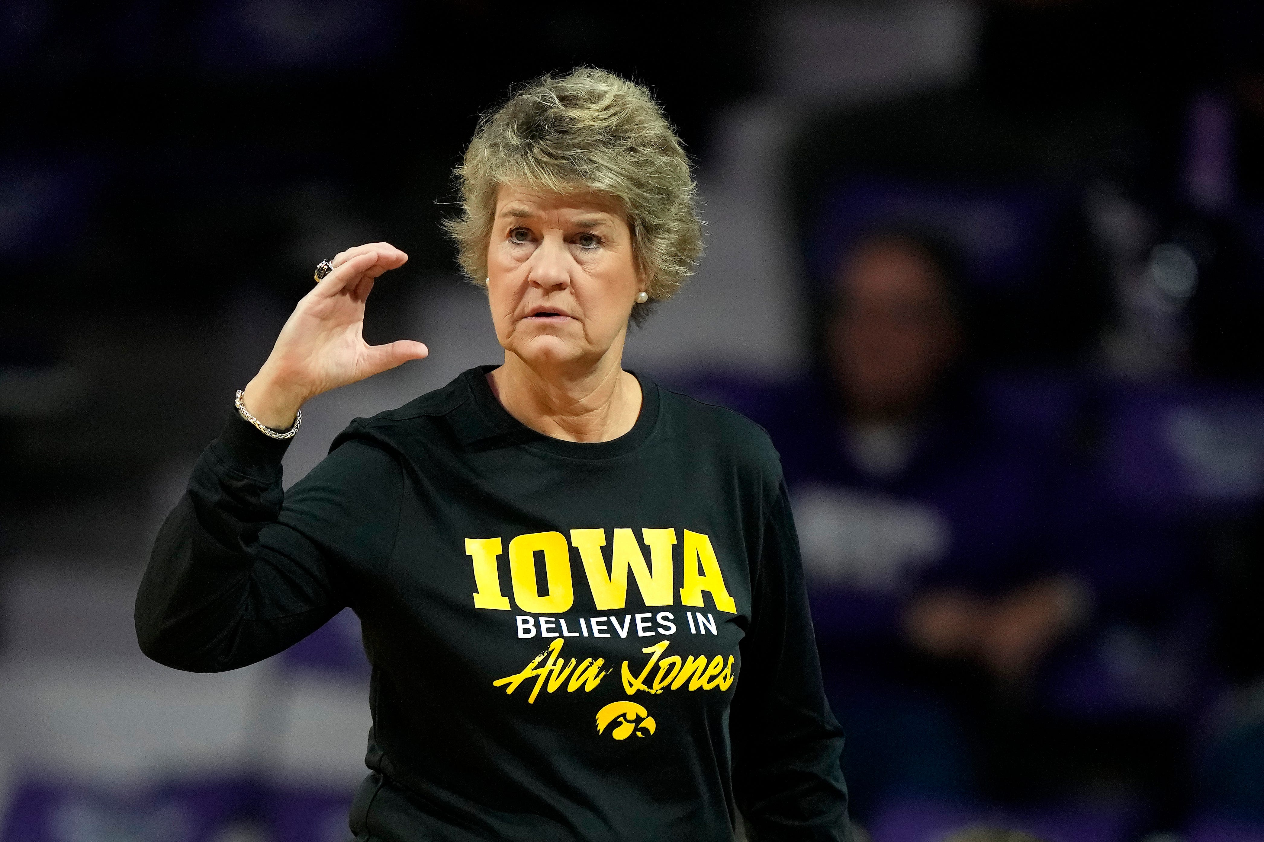 Iowa head coach Lisa Bluder motions to her players during the first half of an NCAA college basketball game against Kansas State, Thursday, Nov. 17, 2022, at Bramlage Coliseum in Manhattan, Kan.